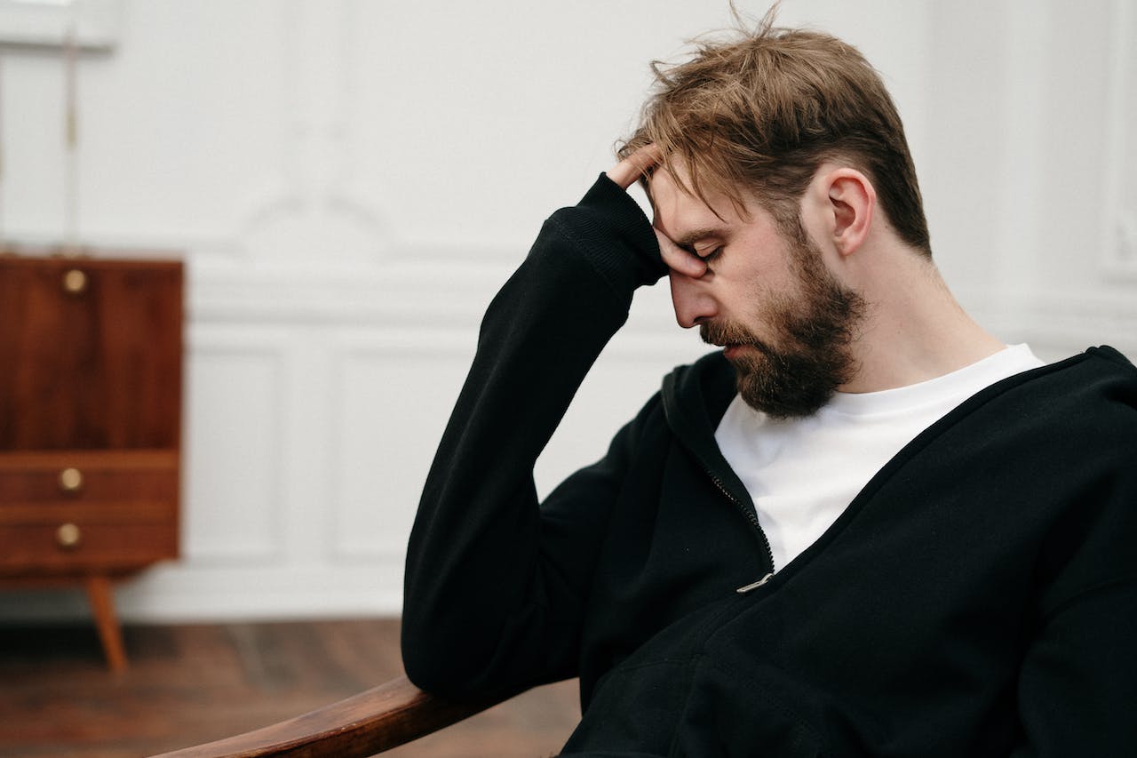 man stressed mental health issues